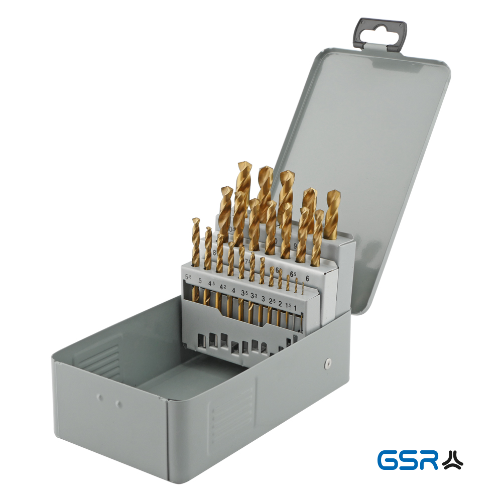 The gray metal box stands open and was photographed from the side. The cassette contains 24 gold twist drills in the sizes 1.0 - 10.5 mm +3.3 / 4.2 / 6.8 / 10.2 mm. The twist drills are marked with the respective size.